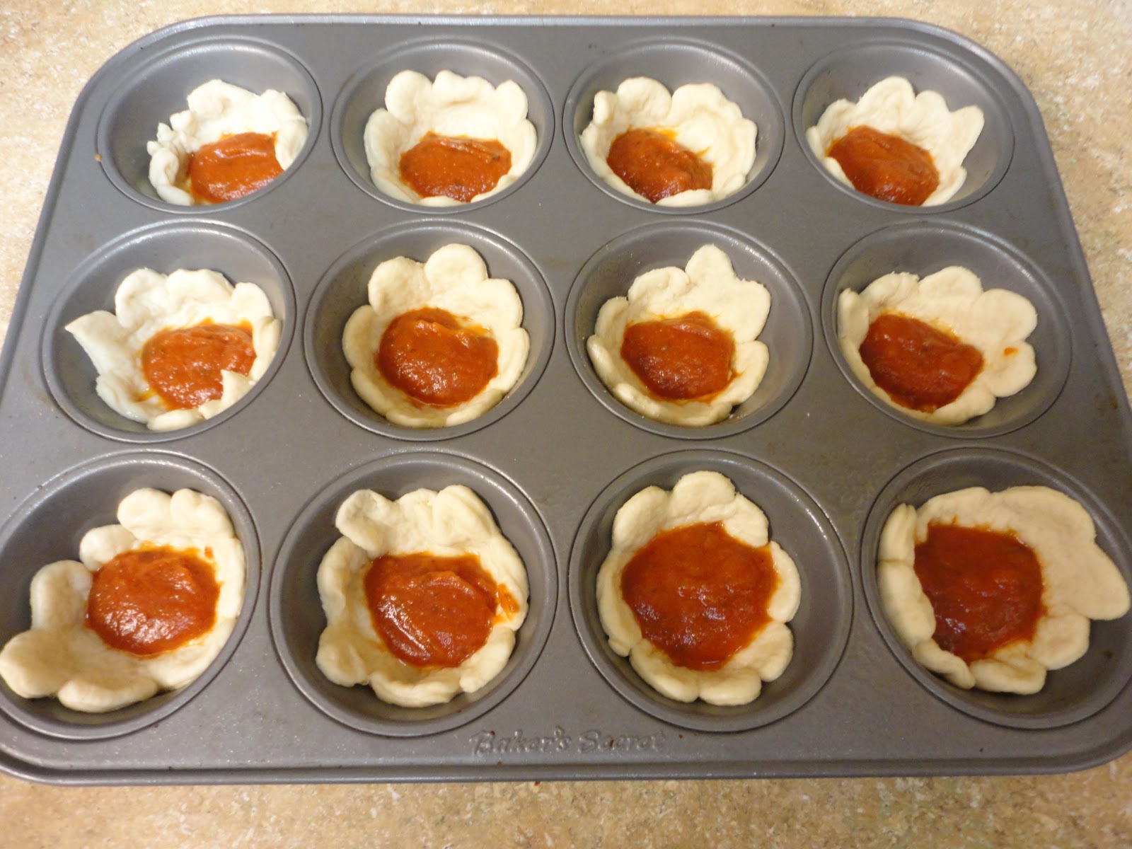 *Riches to Rags* by Dori Muffin Pan Pizza