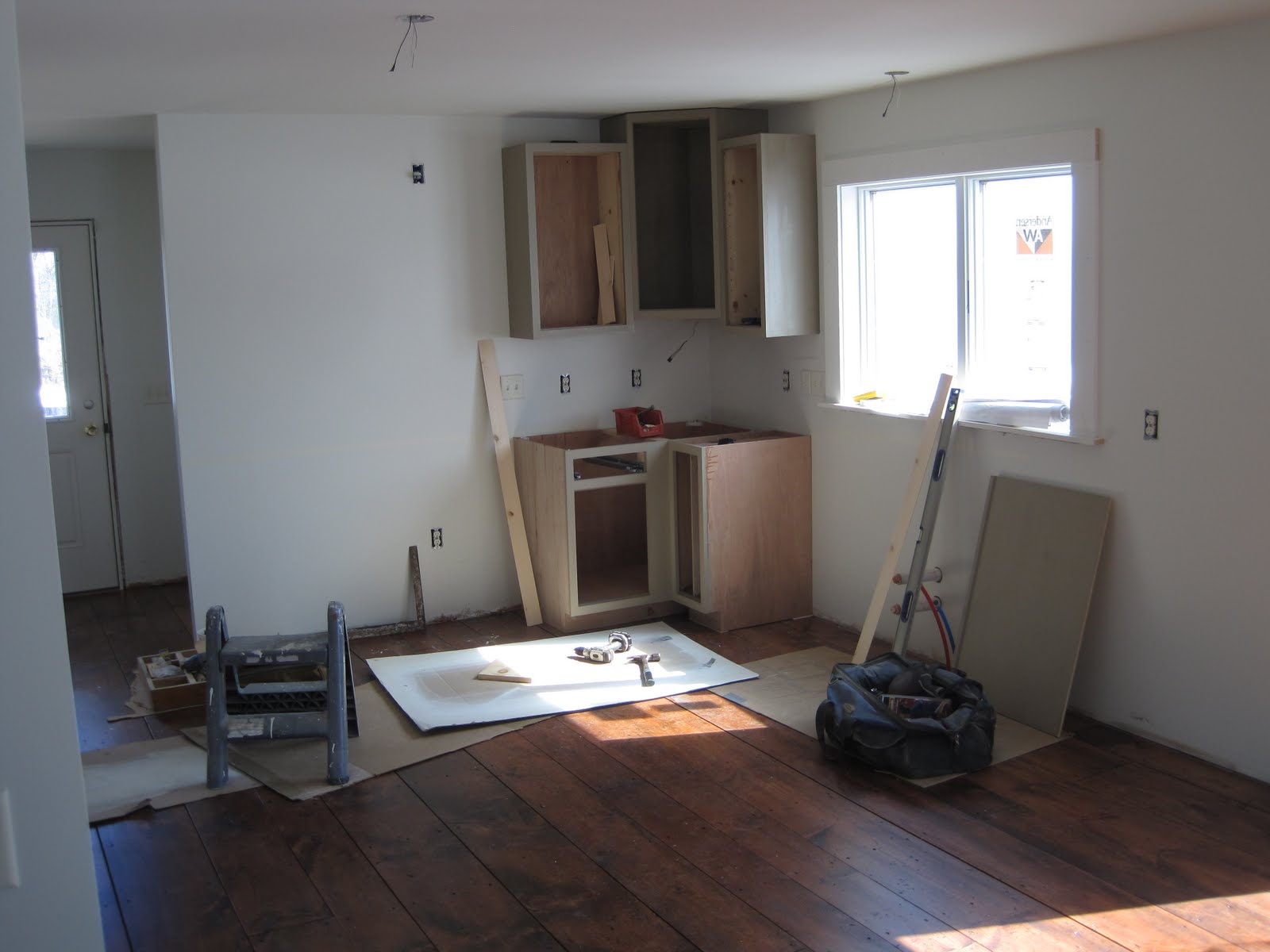 Ready kitchen cabinets The first cabinets to go in.
