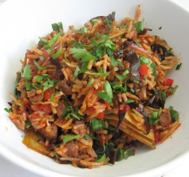 Hot rice salad with Mediterranean vegetables