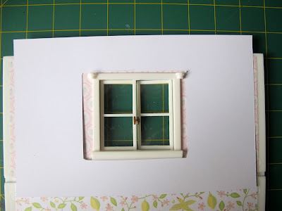 Template on top of a Lundby wall, showing that it doesn't fit.