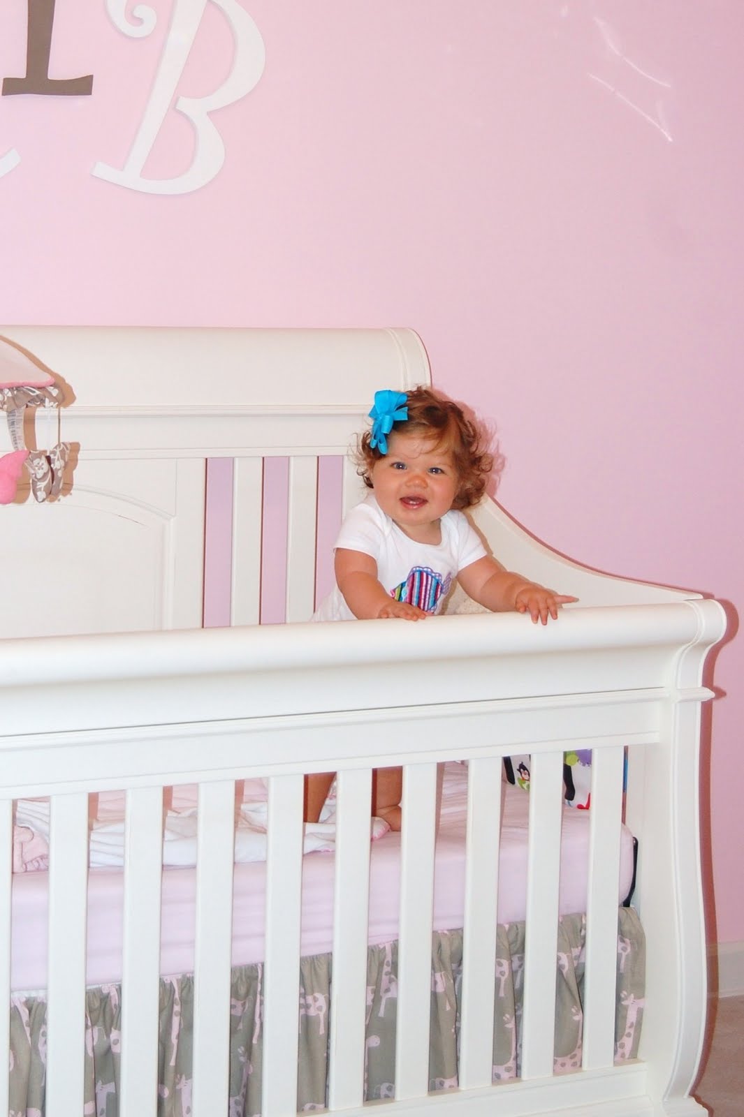 how to lower crib mattress