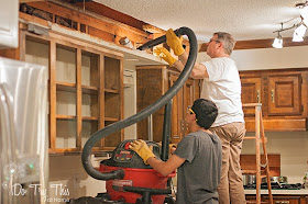 Do Try This at Home: removing cabinets over the sink, vacuuming out the light fixture