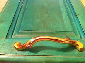 gold handles door painted green