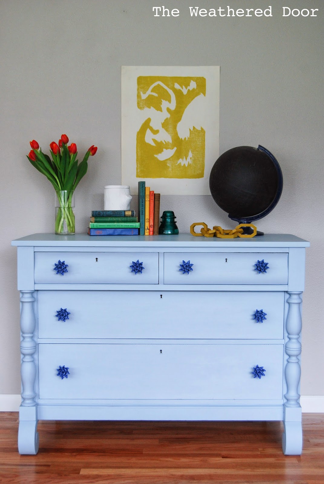 A Light Blue Empire Dresser With Anthropologie Knobs The