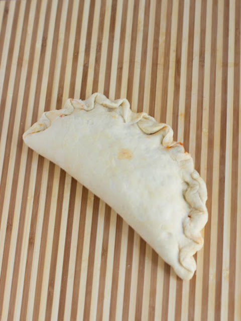 Roasted Tomato and Cheese Calzones ohsweetbasil.com Roasted Tomato and Cheese Calzones ohsweetbasil.com