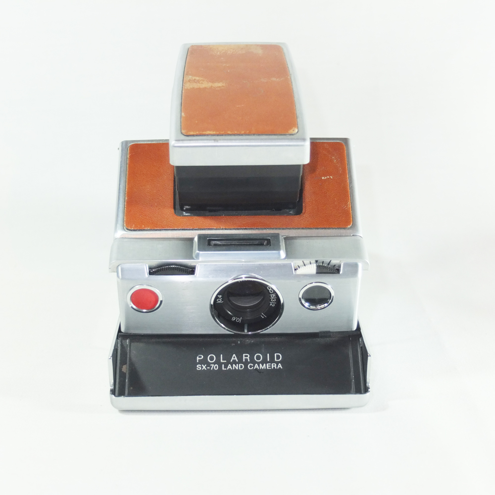 Polaroid SX-70 Macchina Fotografica Istantanea + Custodia in cuoio ori –  sviluppo rullino