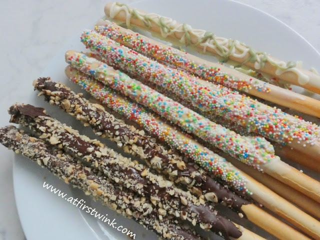 chocolate covered bread sticks with sprinkles