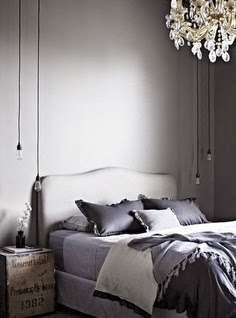 grey and white bedroom with dark grey bedding