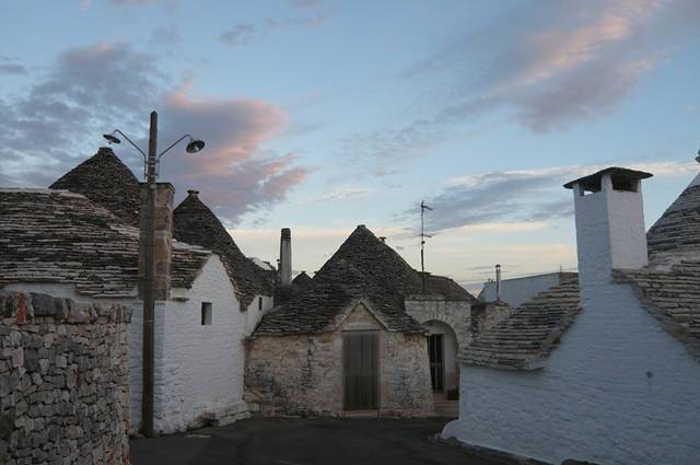 Alberobello a Unique Italian Village Alberobello, the city of drystone dwellings known as trulli , is an exceptional example of vernacular architecture. It is one of the best preserved and most homogeneous urban areas of this type in Europe. Its special features, and the fact that the buildings are still occupied, make it unique. It also represents a remarkable survival of prehistoric building techniques.