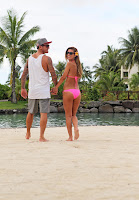 Audrina Patridge shows off her awesome curves in a pink bikini at a beach in TAhiti
