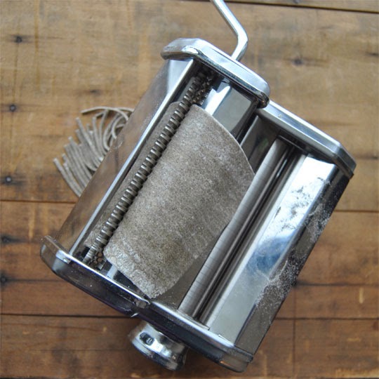 After the dough has rested, pull a palm sized chunk of dough from the