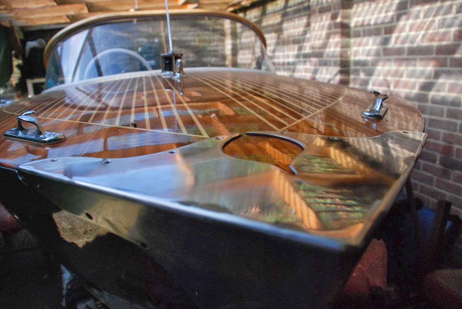 my wooden speed boat build Stainless steel trim and Bow plate