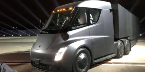 Elon Musk unveils Tesla electric truck – and a surprise new sports car