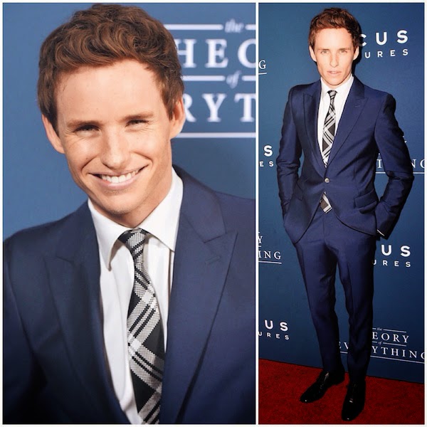 Eddie Redmayne wears Alexander McQueen Pre AW14 blue one-button suit with McQueen shoulder and silk check tie to attend the premiere of ‘The Theory of Everything’ in Los Angeles, on Tuesday 28th October 2014