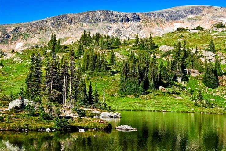 Vivid and Remote Azure Lake in Canada Vivid and Remote Azure Lake in Canada