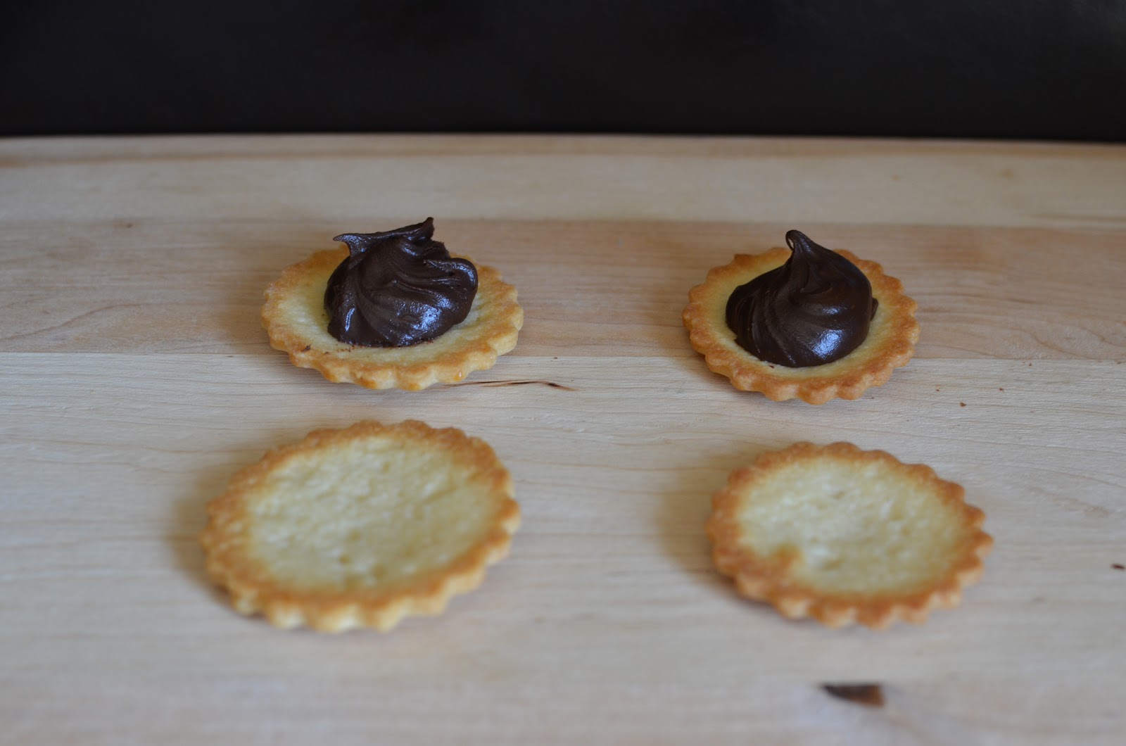 Playing with Flour Biscuit sandwich cookies with chocolate fudge