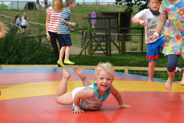 Tin Box Tot on a bouncy castle