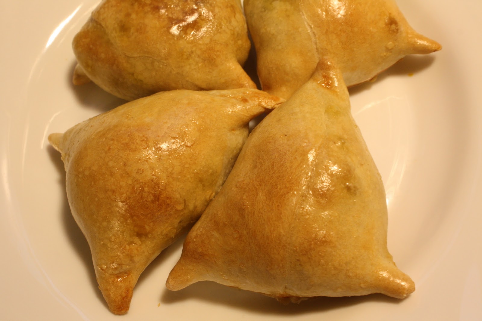 Vonj po sveže zapečenem kruhu Oven baked samosa
