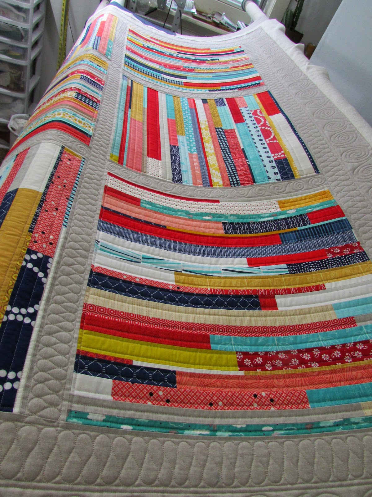 The Quilting Mill "Woven" quilt by Kati Spencer in Scraps, Inc.
