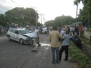A picture of an accident involving two cars. A picture of an accident involving two cars.