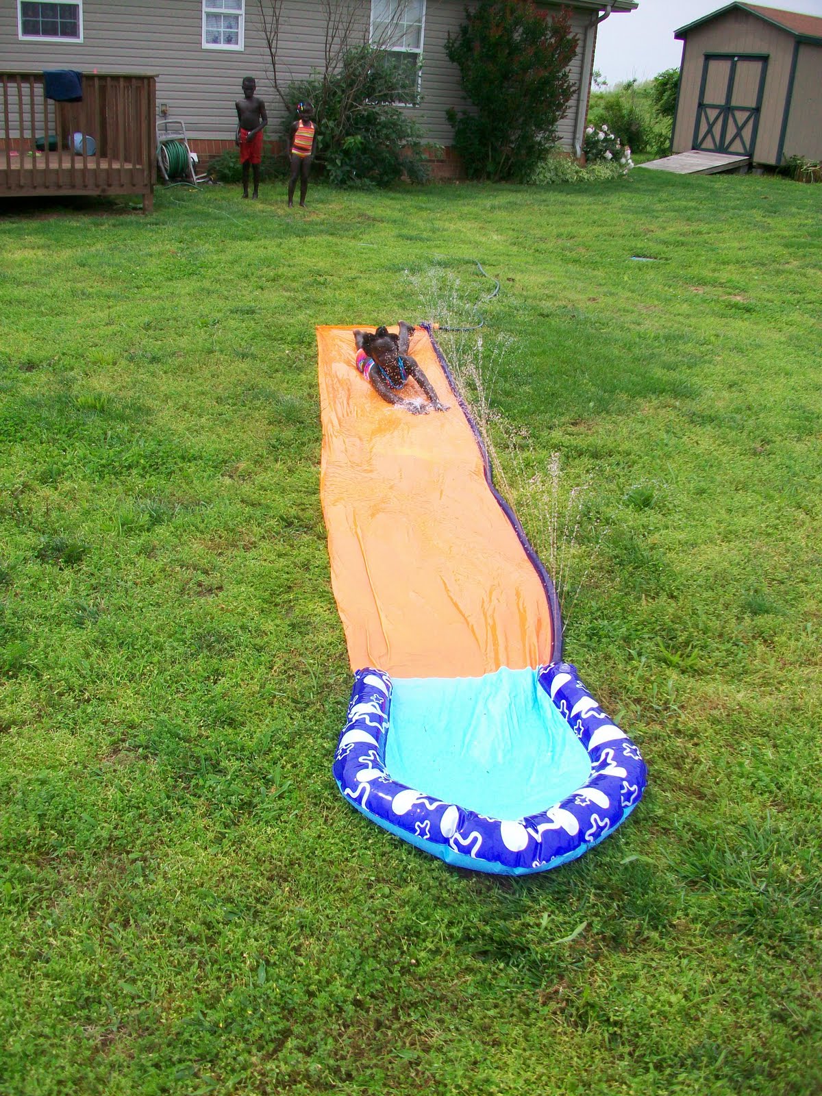 Our Adoption Adventure Slip 'N Slide & Water Balloons at Grandpa