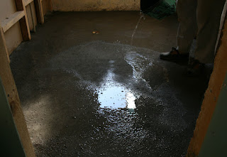 Damping down the new concrete Damping down the new concrete