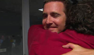 Curiosity MSL lands on Mars. Adam Stelzner embraces team members after the first pictures confirm touchdown on Mars. 6 August 2012. NASA/JPL.