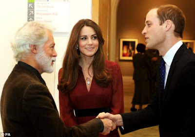 Their muse: The Duchess introduces her husband to artist Paul Emsley after viewing his portrait at the National Portrait Gallery