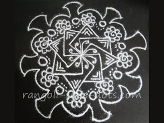 swastik based white rangoli design rangoli-25-e.jpg