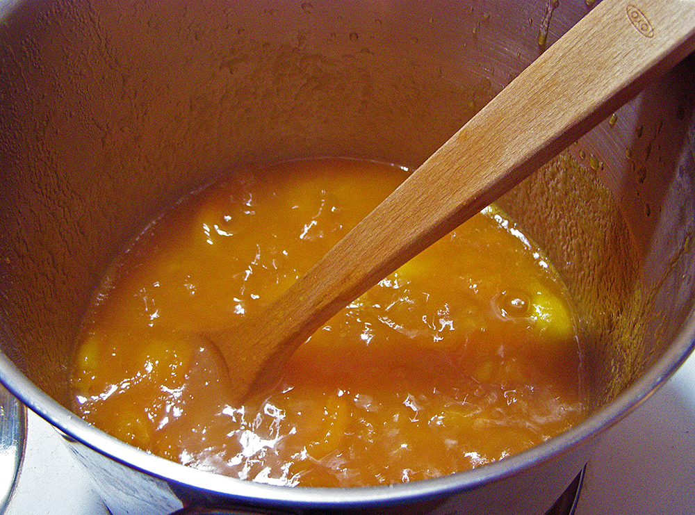 Jam Pot with Just a few bubbles in Apricots