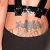 cheryl cole arm and lower back tattoo designs