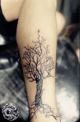 tree tattoo on the leg
