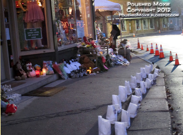 Click on the shop image to enlarge it in a new tab. Image of memorial in front of a Sandy Hook shop.