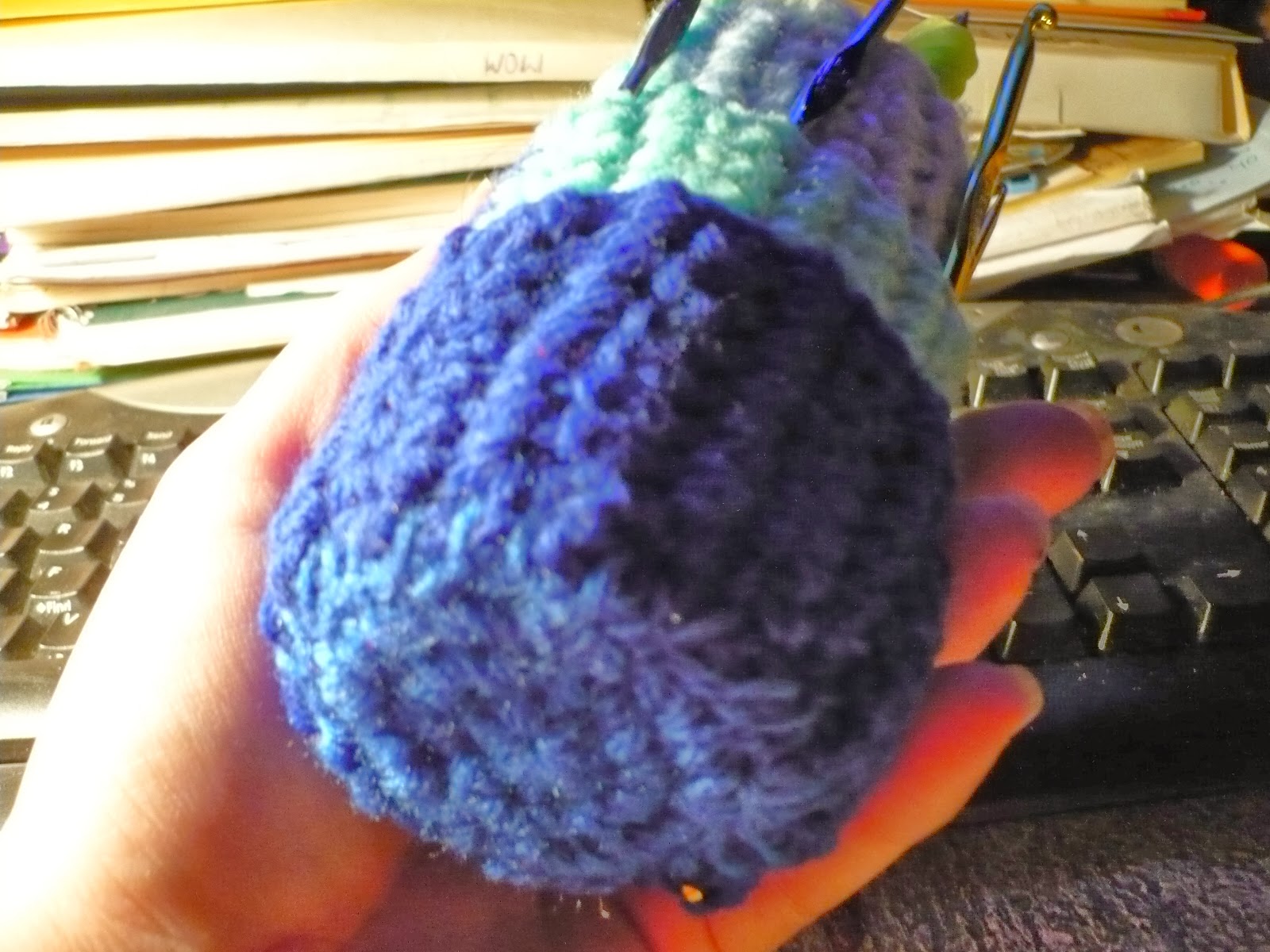 ... bottom. Several stitches are sewn through the paper roll as well