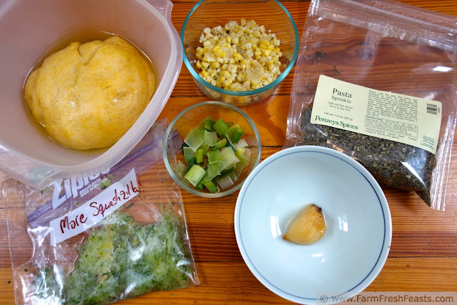 http://www.farmfreshfeasts.com/2013/07/zucchini-corn-and-leek-pizza-with-pesto.html