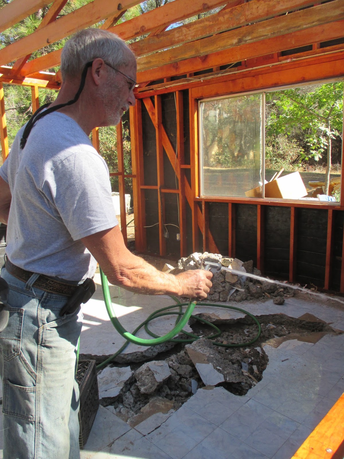 Triangle Greenhouse Stucco Removal North Wall
