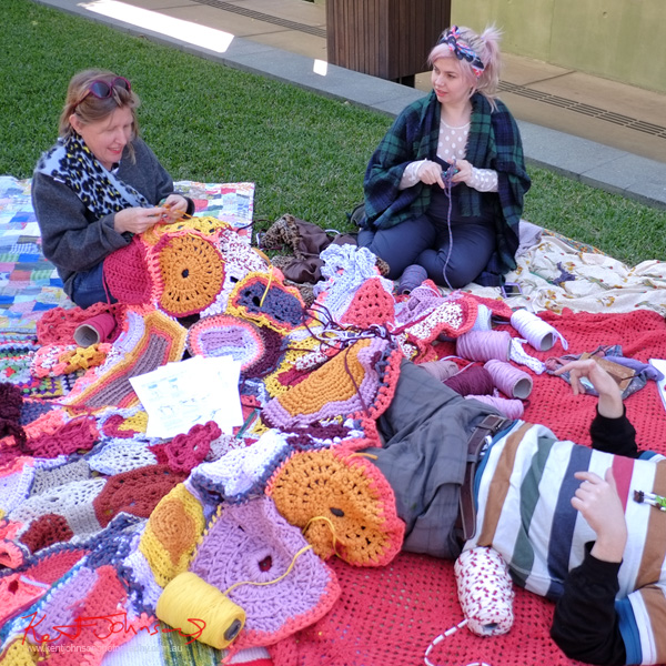 Knit Your Bit, outside the Queensland State Library, South Bank Brisbane. Photo by Kent Johnson. Knit Your Bit, outside the Queensland State Library, South Bank Brisbane. Photo by Kent Johnson.