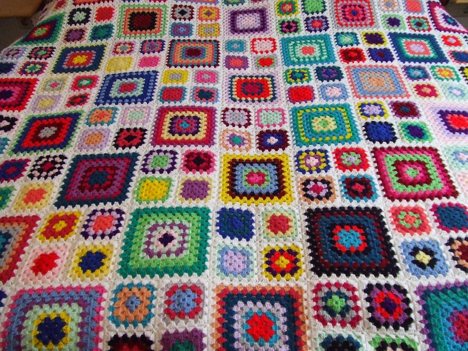 My world of crochet Multicolor Granny Square Bedspread is finished!!!