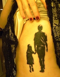 FATHER AND DAUGHTER BLACK TATTOO ON SIDE BODY