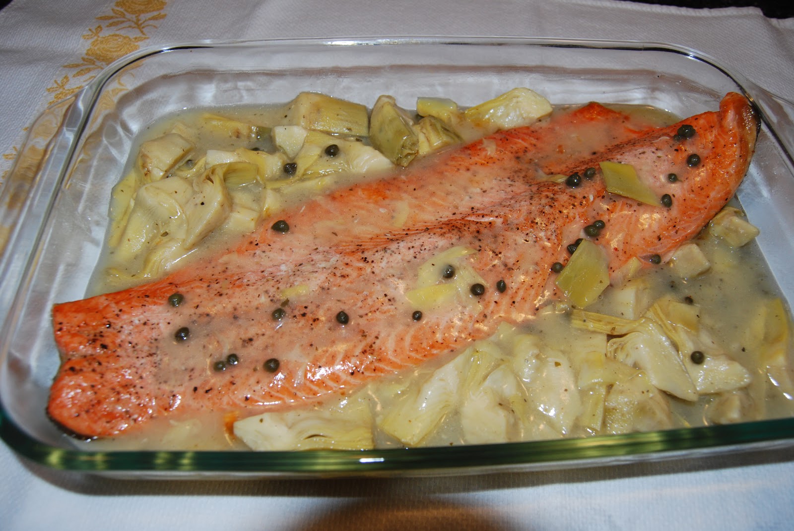 Greek Fusion Cuisine Salmon with Lemon Artichoke and Capers Sauce