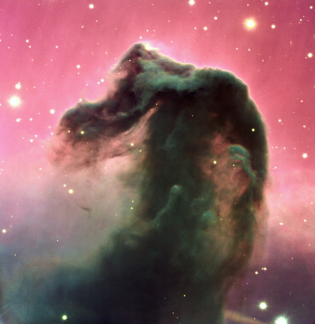 The Horsehead Nebula  A reproduction of a composite colour image of the Horsehead Nebula and its immediate surroundings. It is based on three exposures in the visual part of the spectrum with the FORS2 multi-mode instrument at the 8.2-m KUEYEN telescope at Paranal. It was produced from three images, obtained on February 1, 2000, with the FORS2 multi-mode instrument at the 8.2-m KUEYEN Unit Telescope and extracted from the VLT Science Archive Facility . The frames were obtained in the B-band (600 sec exposure; wavelength 429 nm; FWHM 88 nm; here rendered as blue), V-band (300 sec; 554 nm; 112 nm; green) and R-band (120 sec; 655 nm; 165 nm; red). The original pixel size is 0.2 arcsec. The photo shows the full field recorded in all three colours, approximately 6.5 x 6.7 arcmin 2 . The seeing was about 0.75 arcsec.  Image Credit: ESO Explanation from: http://www.eso.org/public/images/eso0202a/