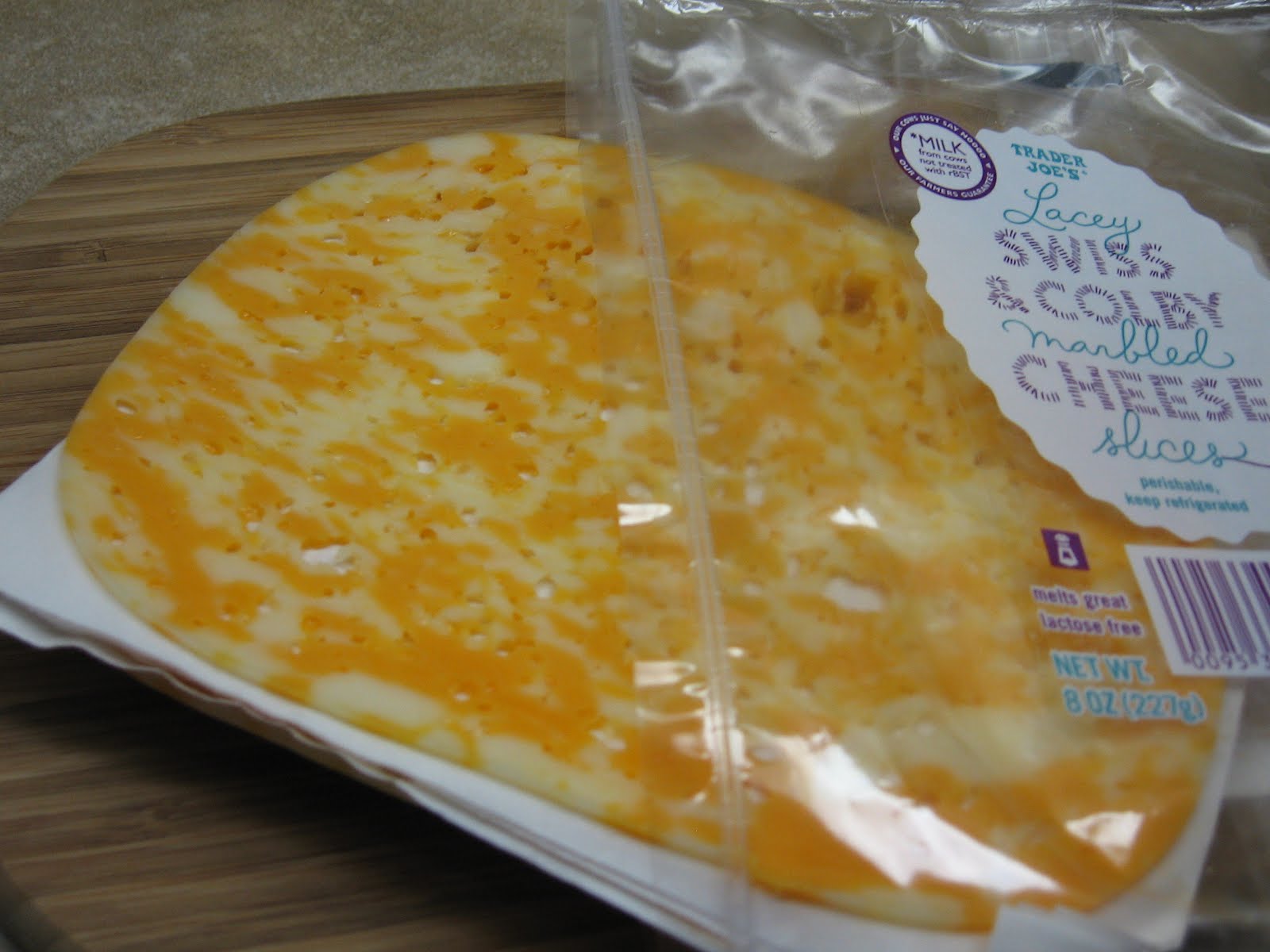 Please, DON'T pass the salt! Trader Joe's Lacey Swiss & Colby Cheese