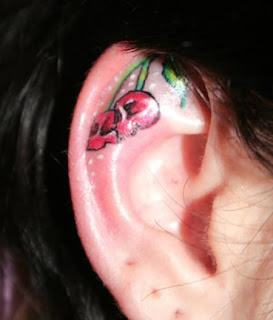 ear tattoos will have more exposure to sunlight, you may want to cover your design with sun block lotion to prevent the symbol from changing color or fading. Since behind the ear tattoo is highly visible when you want to show it, you should find a design which impress you or has significance to you. For women who are on top of the latest fashion and tattoo trend, you can consider dying your hair, getting your nose pierced and having your behind ear inked.