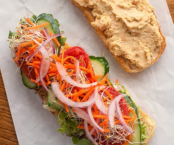 Lemony Hummus Sandwich with Cucumber, Radish Sprouts, and Red Onion