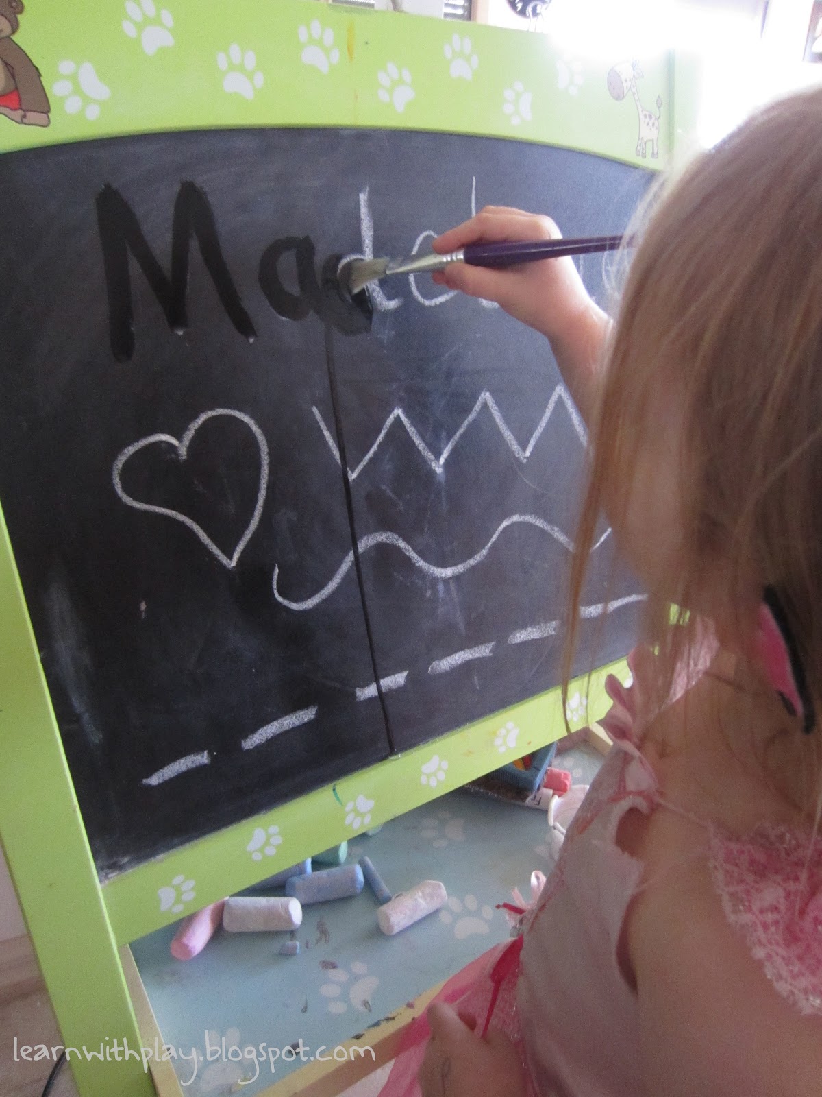 Learn with Play at Home Tracing & Writing Practice with Water on the Chalkboard