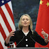 Clinton acuza China