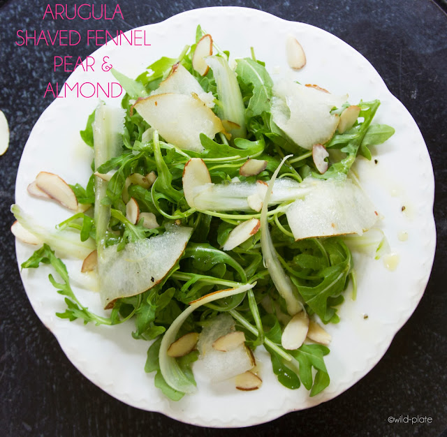Wild + Free Arugula salad with shaved fennel, pear and slivered almonds