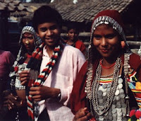 Thraru people and women in cultural dress