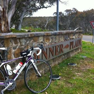 Bike parked against Dinner Plain summit sign