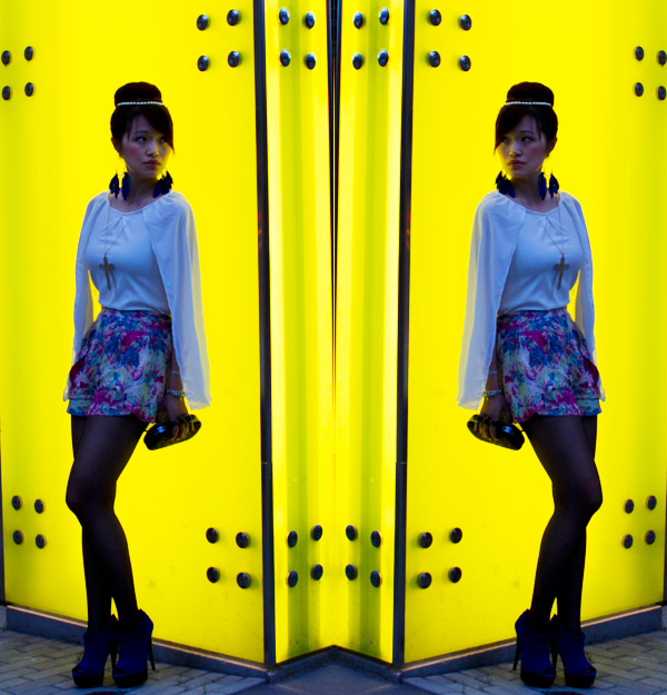 HandM electric blue feather earrings, wholesale7 white angel top, sugarlips different strokes shorts, colourful shorts, sugarlips shorts, opaque tights, cross necklace, tobi clutch inspired by alexander mcqueen, electric blue heels, hot heels, pearl necklace head piece, fashion, style, street style, vancouver street style blog, fashion blog, unique style, unique fashion, amazing style, amazing fashion
